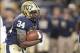 Nov 9, 2013; Pittsburgh, PA, USA; Pittsburgh Panthers running back Isaac Bennett (34) carries the ball against the Notre Dame Fighting Irish during the second quarter at Heinz Field. PITT won 28-21. Mandatory Credit: Charles LeClaire-USA TODAY Sports