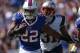 ORCHARD PARK, NY - SEPTEMBER 8: Fred Jackson #22 of the Buffalo Bills rushes with the ball during NFL game action as Aqib Talib #31 of the New England Patriots prepares to tackle him at Ralph Wilson Stadium on September 8, 2013 in Orchard Park, New York.