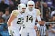 FORT WORTH, TX - NOVEMBER 30: (L-R) Clay Fuller #23 of the Baylor Bears and Bryce Petty #14 celebrate a touchdown against the TCU Horned Frogs at Amon G. Carter Stadium on November 30, 2013 in Fort Worth, Texas. (Photo by Ronald Martinez/Getty Images)