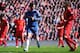 LIVERPOOL, ENGLAND - APRIL 21: Eden Hazard of Chelsea celebrates scoring his penalty during the Barclays Premier League match between Liverpool and Chelsea at Anfield on April 21, 2013 in Liverpool, England. (Photo by Michael Regan/Getty Images)
