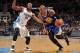 DENVER, CO - December 23: Marreese Speights #5 of the Golden State Warriors drives to the basket against the Denver Nuggets on December 23, 2013 at the Pepsi Center in Denver, Colorado. NOTE TO USER: User expressly acknowledges and agrees that, by downloa