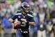Dec 22, 2013; Seattle, WA, USA; Seattle Seahawks quarterback Russell Wilson (3) looks looks for an open receiver during the first half against the Arizona Cardinals at CenturyLink Field. Mandatory Credit: Steven Bisig-USA TODAY Sports