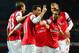 LONDON, ENGLAND - DECEMBER 04: Mesut Oezil of Arsenal celebrates his goal with team mates during the Barclays Premier League match between Arsenal and Hull City at Emirates Stadium on December 4, 2013 in London, England. (Photo by Jamie McDonald/Getty I