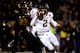 COLUMBIA, MO - NOVEMBER 30: Quarterback Johnny Manziel #2 of the Texas A&M Aggies scrambles as defensive lineman Markus Golden #33 of the Missouri Tigers persues during the game on November 30, 2013 in Columbia, Missouri. (Photo by Jamie Squire/Getty Im