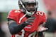 TAMPA, FL - NOVEMBER 17: Cornerback Darrelle Revis #24 of the Tampa Bay Buccaneers warms up for play against the Atlanta Falcons November 17, 2013 at Raymond James Stadium in Tampa, Florida. Tampa won 41 - 28. (Photo by Al Messerschmidt/Getty Images)
