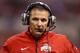 INDIANAPOLIS, IN - DECEMBER 07: Head coach Urban Meyer of the Ohio State Buckeyes calls plays from the sidelines during the Big Ten Conference Championship game against the Michigan State Spartans at Lucas Oil Stadium on December 7, 2013 in Indianapolis,