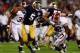 MIAMI GARDENS, FL - JANUARY 07: Everett Golson #5 of the Notre Dame Fighting Irish runs with the ball against C.J. Mosley #32 of the Alabama Crimson Tide during the 2013 Discover BCS National Championship game at Sun Life Stadium on January 7, 2013 in Mi