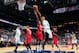 ATLANTA, GA - JANUARY 5: Rajon Rondo #9 of the Boston Celtics shoots against Jeff Teague #0 of the Atlanta Hawks on January 5, 2013 at Philips Arena in Atlanta, Georgia. NOTE TO USER: User expressly acknowledges and agrees that, by downloading and/or us