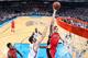 OKLAHOMA CITY, OK - DECEMBER 22: Jonas Valanciunas #17 of the Toronto Raptors shoots against the Oklahoma City Thunder on December 22, 2013 at the Chesapeake Energy Arena in Oklahoma City, Oklahoma. NOTE TO USER: User expressly acknowledges and agrees th