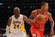 LOS ANGELES, CA - DECEMBER 25: Derrick Rose #1 of the Chicago Bulls drives against Kobe Bryant #24 of the Los Angeles Lakers at Staples Center on December 25, 2011 in Los Angeles, California. NOTE TO USER: User expressly acknowledges and agrees that, by