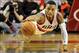 Dec 21, 2013; Portland, OR, USA; Portland Trail Blazers point guard Damian Lillard (0) dives for a loose ball during the fourth quarter of the game against the New Orleans Pelicans at the Moda Center. The Blazers won the game 110-107. Mandatory Credit: St