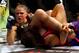 March 3, 2012; Columbus, OH, USA; Ronda Rousey punches Miesha Tate during the Strikeforce Grand Prix final at Nationwide Arena. Mandatory Credit: Greg Bartram-USA TODAY Sports