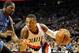 Dec 4, 2013; Portland, OR, USA; Portland Trail Blazers point guard Damian Lillard (0) drives to the basket on Oklahoma City Thunder small forward Kevin Durant (35) during the fourth quarter of the game at the Moda Center. The Blazers won the game 111-104.