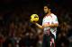 LONDON, ENGLAND - NOVEMBER 02: Luis Suarez of Liverpool prepares to take a throw in during the Barclays Premier League match between Arsenal and Liverpool at Emirates Stadium on November 2, 2013 in London, England. (Photo by Laurence Griffiths/Getty Ima