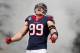 HOUSTON, TX - DECEMBER 22: J.J. Watt #99 of the Houston Texans enters the field before the game against the Denver Broncos at Reliant Stadium on December 22, 2013 in Houston, Texas. (Photo by Scott Halleran/Getty Images)