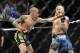 Dec 15, 2012; Las Vegas, NV, USA; Dustin Poirier (left) throws a jab at Jonathan Brookins (right) during their featherweight undercard bout in the Ultimate Fighter Finale at The Joint at the Hard Rock Hotel and Casino. Poirier won by KO. Mandatory Credit