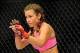 August 18, 2012; San Diego, CA, USA; Miesha Tate (white shorts) fights Julie Kedzie (black shorts) in their Strikeforce MMA Women's Bantamweight Bout at the Valley View Casino Center. Mandatory Credit: Jayne Kamin-Oncea-USA TODAY Sports