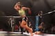 PHOENIX - AUGUST 13: Miesha Tate celebrates after defeating Hitomi Akano of Japan in the Strikeforce Women's Welterweight Tournament Championship bout at Dodge Theater on August 13, 2010 in Phoenix, Arizona. (Photo by Christian Petersen/Getty Images)