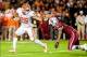 Nov 30, 2013; Columbia, SC, USA; Clemson Tigers running back Roderick McDowell (25) rushes for a touchdown around South Carolina Gamecocks linebacker Sharrod Golightly (9) in the second half at Williams-Brice Stadium. Mandatory Credit: Jeff Blake-USA TODA