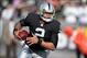 Dec 15, 2013; Oakland, CA, USA; Oakland Raiders quarterback Terrelle Pryor (2) carries the ball against the Kansas City Chiefs at O.co Coliseum. Mandatory Credit: Kirby Lee-USA TODAY Sports