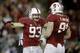 PALO ALTO, CA - NOVEMBER 07: Linebacker Trent Murphy #93 and defensive end Henry Anderson #91 of the Stanford Cardinal celebrate after Marcus Mariota #8 of the Oregon Ducks is sacked in the first quarter at Stanford Stadium on November 7, 2013 in Palo Al