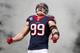 HOUSTON, TX - DECEMBER 22: J.J. Watt #99 of the Houston Texans enters the field before the game against the Denver Broncos at Reliant Stadium on December 22, 2013 in Houston, Texas. (Photo by Scott Halleran/Getty Images)