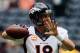 HOUSTON, TX - DECEMBER 22: Peyton Manning #18 of the Denver Broncos works out on the field prior to the start of the game against the Houston Texans at Reliant Stadium on December 22, 2013 in Houston, Texas. (Photo by Scott Halleran/Getty Images)