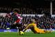 LIVERPOOL, ENGLAND - DECEMBER 26: Tim Howard (R) of Everton fouls Ki Sung-Yueng of Sunderland inside the penalty box during the Barclays Premier League match between Everton and Sunderland at Goodison Park on December 26, 2013 in Liverpool, England. (Phot