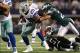 Dec 2, 2012; Arlington, TX, USA; Dallas Cowboys running back DeMarco Murray (29) runs with the ball against Philadelphia Eagles cornerback Nnamdi Asomugha (24) at Cowboys Stadium. Mandatory Credit: Matthew Emmons-USA TODAY Sports