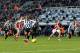 NEWCASTLE, UNITED KINGDOM - DECEMBER 26: Loic Remy of Newcastle United sees his penalty saved by Thomas Sorenson of stoke City during the Barclays Premier League match between Newcastle United and Stoke City at St James' Park on December 26, 2013 in Newc