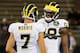 EAST HARTFORD, CT - SEPTEMBER 21: Devin Gardner #98 and Shane Morris #7 of the Michigan Wolverines talk before a game with Connecticut Huskies at Rentschler Field on September 21, 2013 in East Hartford, Connecticut. (Photo by Jim Rogash/Getty Images)