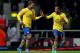 LONDON, ENGLAND - DECEMBER 26: Lukas Podolski of Arsenal (L) celebrates with Theo Walcott as he scores their third goal during the Barclays Premier League match between West Ham United and Arsenal at Boleyn Ground on December 26, 2013 in London, England.