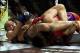 March 3, 2012; Columbus, OH, USA; Ronda Rousey gets Miesha Tate in an armbar during the Strikeforce Grand Prix final at Nationwide Arena. Mandatory Credit: Greg Bartram-USA TODAY Sports