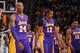 DENVER, CO - FEBRUARY 25: Kobe Bryant #24, Dwight Howard #12 and Metta World Peace #15 of the Los Angeles Lakers walk to the sideline for a timeout during their game against the Denver Nuggets on February 25, 2013 at the Pepsi Center in Denver, Colorado.