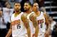 Nov 8, 2013; Phoenix, AZ, USA; Phoenix Suns power forward Marcus Morris (15) power forward Markieff Morris (11) and power forward Channing Frye (8) on the court during the fourth quarter against the Denver Nuggets at US Airways Center. Mandatory Credit: C