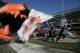 CHICAGO - DECEMBER 3: A flag bearer and mascot carry giant flags onto the field before the Chicago Bears game against the Minnesota Vikings on December 3, 2006 at Soldier Field in Chicago, Illinois. The Bears defeated the Vikings 23-13 to clinch the NFC