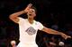 LOS ANGELES, CA - DECEMBER 25: Nick Young #0 of the Los Angeles Lakers celebrates after making a three point basket against the Miami Heat at Staples Center on December 25, 2013 in Los Angeles, California. The Heat won 101-95. NOTE TO USER: User express