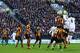 HULL, ENGLAND - DECEMBER 26: Chris Smalling (#12) of Manchester United scores his sides opening goal with a header during the Barclays Premier League match between Hull City and Manchester United at KC Stadium on December 26, 2013 in Hull, England. (Pho