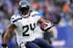 EAST RUTHERFORD, NJ - DECEMBER 15: Marshawn Lynch #24 of the Seattle Seahawks carries the ball in the third quarter against the New York Giants at MetLife Stadium on December 15, 2013 in East Rutherford, New Jersey.The Seattle Seahawks defeated the New Yo