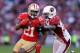 SAN FRANCISCO, CA - DECEMBER 30: Frank Gore #21 of the San Francisco 49ers tries to run away from Adrian Wilson #24 of the Arizona Cardinals at Candlestick Park on December 30, 2012 in San Francisco, California. (Photo by Ezra Shaw/Getty Images)