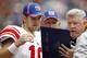HOUSTON - OCTOBER 10: Quarterback Eli Manning #10 of the New York Giants looks over plays with offensive coordinator Kevin Gilbride during a football game against the Houston Texans at Reliant Stadium on October 10, 2010 in Houston, Texas. (Photo by Bo