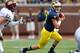 ANN ARBOR, MI - AUGUST 31: Shane Morris #7 of the Michigan Wolverines rolls out during a game with the Central Michigan Chippewas at Michigan Stadium on August 31, 2013 in Ann Arbor, Michigan. (Photo by Gregory Shamus/Getty Images)