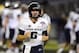 Dec 26, 2013; San Diego, CA, USA; Utah State Aggies quarterback Darell Garretson (6) celebrates after a touchdown in the second half against the Northern Illinois Huskies during the 2013 Poinsettia Bowl at Qualcomm Stadium. Mandatory Credit: Christopher H