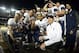 Dec 26, 2013; San Diego, CA, USA; Utah State running back Joey DeMartino (28) and coach Matt Wells pose with the championship trophy after the 2013 Poinsettia Bowl against the Northern Illinois Huskies at Qualcomm Stadium. Utah State defeated Northern Ill
