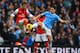 MANCHESTER, ENGLAND - DECEMBER 14: Mathieu Flamini of Arsenal and Samir Nasri of Manchester City battle for the ball during the Barclays Premier League match between Manchester City and Arsenal at Etihad Stadium on December 14, 2013 in Manchester, Englan