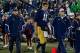 Oct 19, 2013; South Bend, IN, USA; Notre Dame Fighting Irish quarterback Tommy Rees (11) leaves the field after being injured in the third quarter against the USC Trojans at Notre Dame Stadium. Notre Dame won 14-10. Mandatory Credit: Matt Cashore-USA TODA