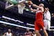 BOSTON, MA - DECEMBER 21: Marcin Gortat #4 of the Washington Wizards goes up for a layup in front of Jared Sullinger #7 of the Boston Celtics in the second half during the game at TD Garden on December 21, 2013 in Boston, Massachusetts. NOTE TO USER: User