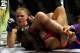 March 3, 2012; Columbus, OH, USA; Ronda Rousey punches Miesha Tate during the Strikeforce Grand Prix final at Nationwide Arena. Mandatory Credit: Greg Bartram-USA TODAY Sports