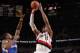 PORTLAND, OR - DECEMBER 26: LaMarcus Aldridge #12 of the Portland Trail Blazers shoots the ball against the Los Angeles Clippers on December 26, 2013 at the Moda Center Arena in Portland, Oregon. NOTE TO USER: User expressly acknowledges and agrees that,