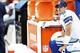 Dec 22, 2013; Landover, MD, USA; Dallas Cowboys quarterback Tony Romo (9) watches from the bench against the Washington Redskins in the fourth quarter at FedEx Field. The Cowboys won 24-23. Mandatory Credit: Geoff Burke-USA TODAY Sports
